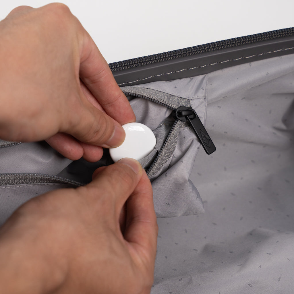 Hidden tracker pocket inside the OSCO Studio Carry-On